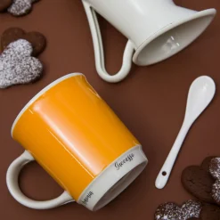 Mug arancione 400 ml con cucchiaino
