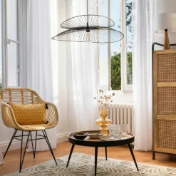 Poltrona in rattan con braccioli Koeta